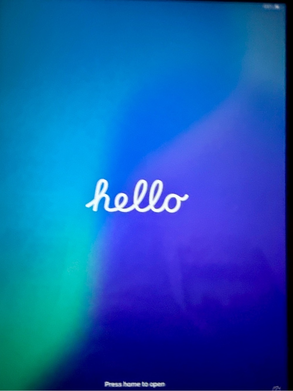 Apple Tablet Display with Blue and Teal Gradient